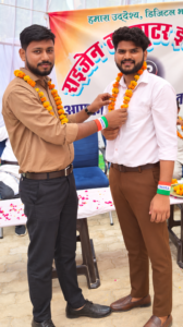 garland ceremony under colorful canopy
